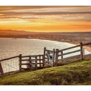 Golden Hour Gate – Sunset Over Sandown Bay